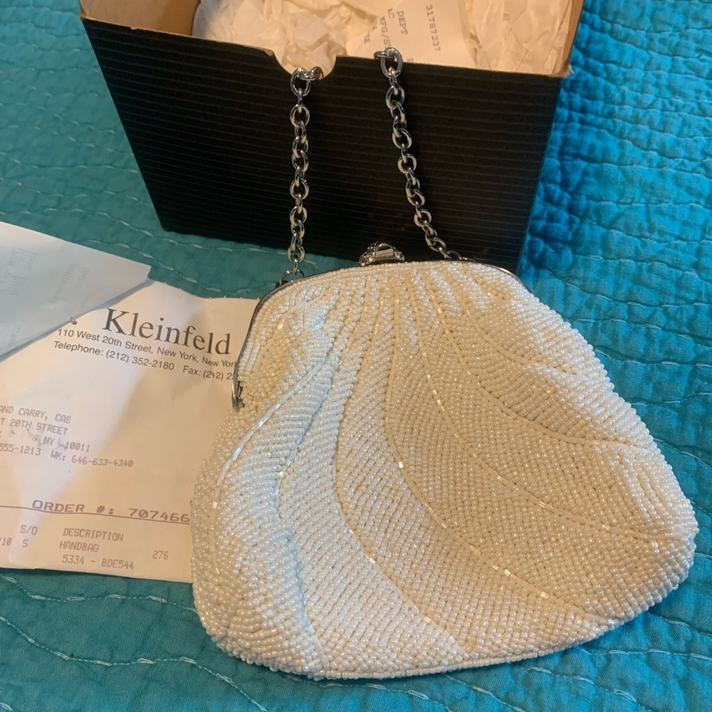 Beautiful pearl handbag from Kleinfield’s of New York. Pristine condition.